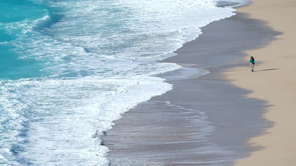 Sand Beach And Waves