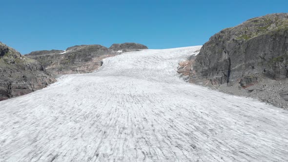 Aerial: beautiful glacier ice sheet, frozen Hardanger glacier alpine landscape