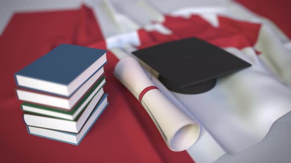Graduation Cap and Diploma on the Canadian Flag