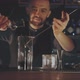 Bartender Making a Cocktail at the Bar - VideoHive Item for Sale