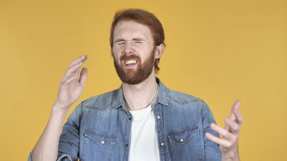 Unhappy Redhead Man Reacting To Failure and Problems, Yellow Background