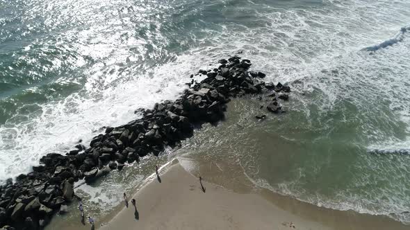 Aerial of waves reaching the shore alt
