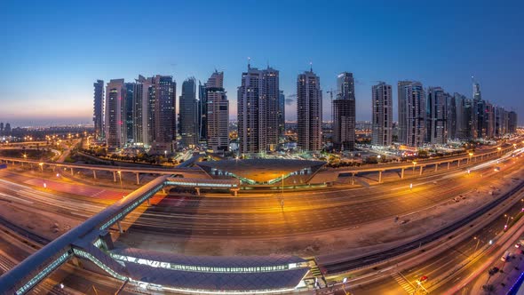 Aerial Top View to Sheikh Zayed Road Near Dubai Marina and JLT Night to Day Timelapse Dubai