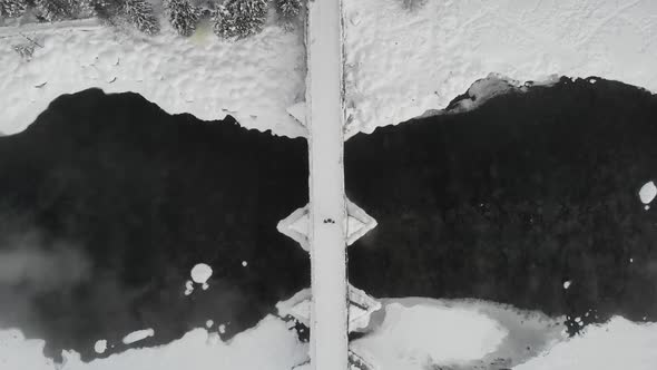 Aerial Video Of The Wooden Bridge With Snow
