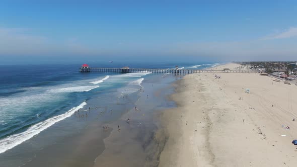 Aerial View of Huntington Pier, Beach and Coastline During Sunny Summer Day