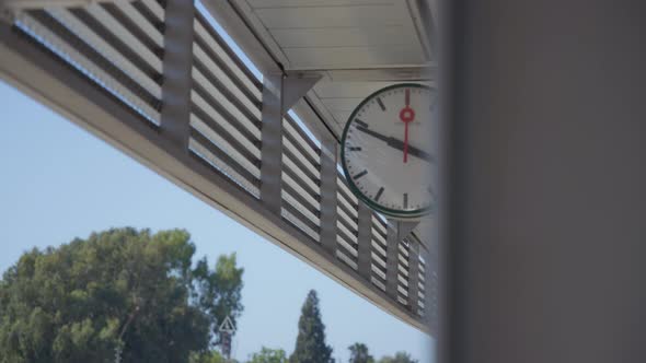 Clock on train platform ceiling