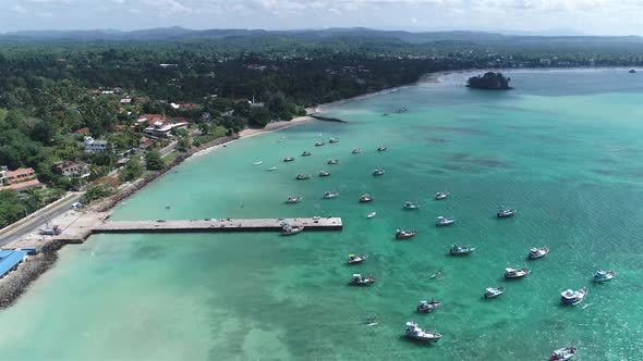 Circling Around Fishing Boats In A Bay