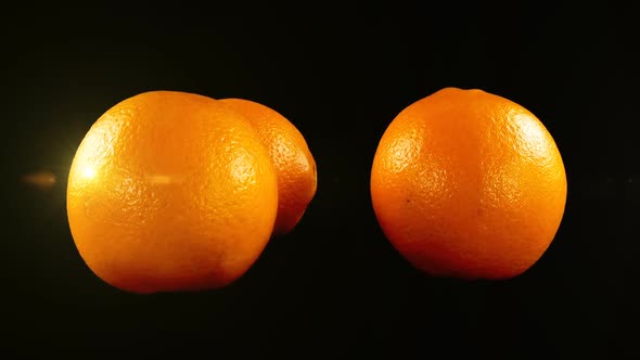 Oranges on a Black Background