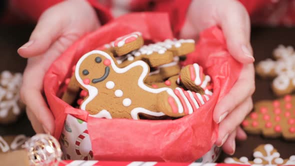 Packaging traditional home made gingerbread cookies as food gifts.