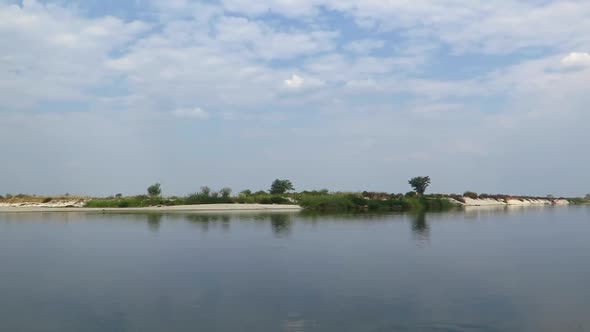 An Afternoon cruise on the might Zambezi river along the Nambia side with a view of Zambia. In summe