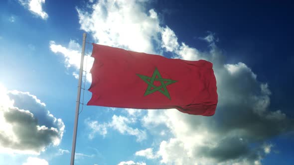 Flag of Morocco Waving at Wind Against Beautiful Blue Sky