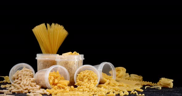 The Range of Different Types of Pasta Dry Slowly Rotates. 