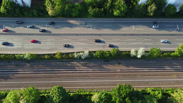 Three lane highway railroad tracks subway s-Bahn.Great aerial view flight stable tripod drone foota