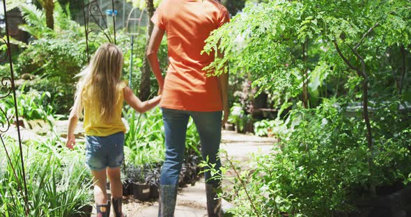 Mother and daughter passing time together in nature