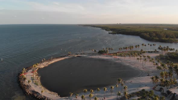 Aerial View of Small Beach Park Leading into Ocean