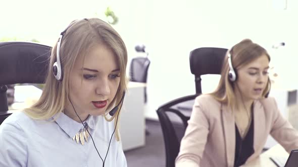 Call Center Agents Speaking with Customer