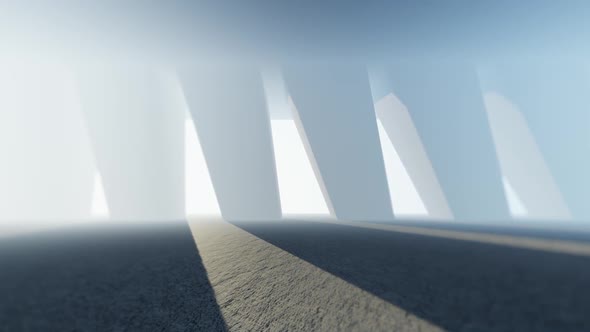 Corridor With Long Concrete Pillars Background And Bright Light