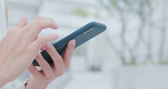 Woman use of smart phone at outdoor