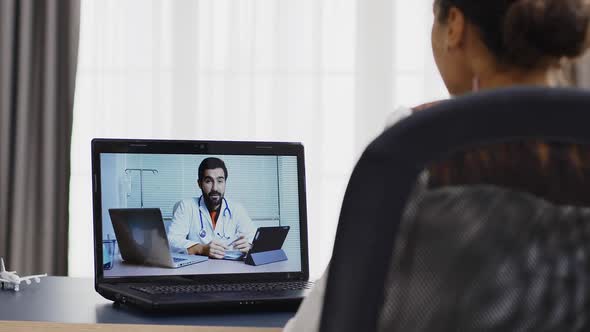Female Patient in a Video Call with Her Therapist