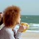 Beautiful Couple Hugging at the Beach Watching the Sea - VideoHive Item for Sale