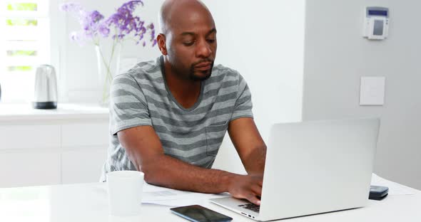 Man using laptop while woman talking on mobile phone 4k