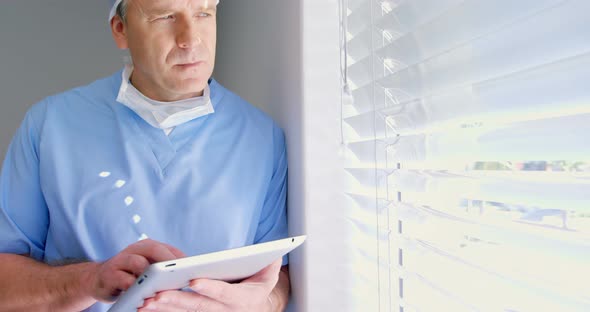 Surgeon using digital tablet