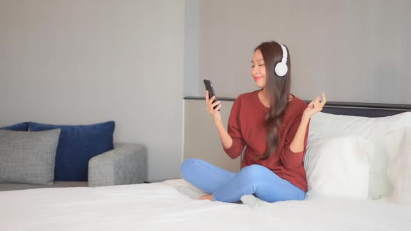 Woman use smart phone for listen music