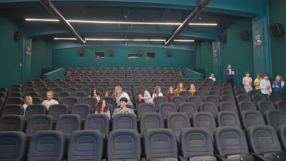 Kids and Teens Entering Cinema Hall.