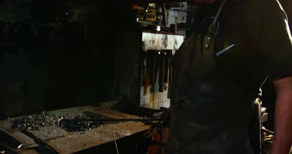 Portrait of blacksmith working