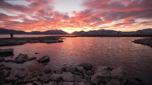 Time lapse of colorful sunrise over lake