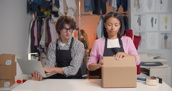 Online Store Merchants Working at Store Preparing Products to Deliver to Customers