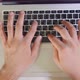 Hand of Man Working at Laptop Computer Typing on Keyboard - VideoHive Item for Sale