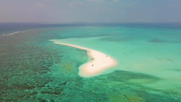 Gorgeous panorama of sandy island in wonderful turquoise water under blue sky in maldives. Sandbank