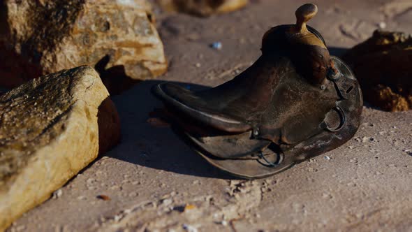 Old Horse Saddle on Sand Beach