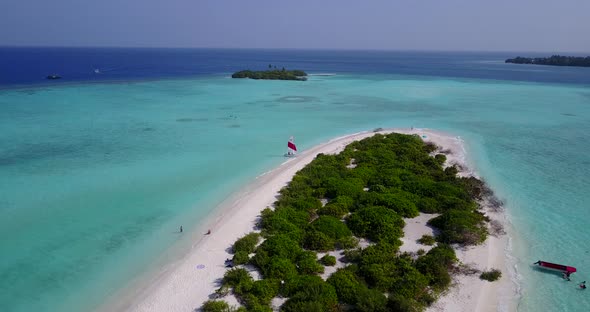 Tropical overhead island view of a summer white paradise sand beach and blue sea background in best 