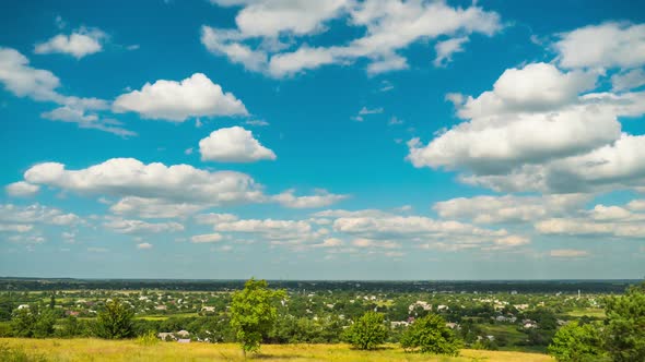 Landscape Fields and Moving Clouds in Blue Sky. Timelapse. Amazing Rural Valley. Ukraine