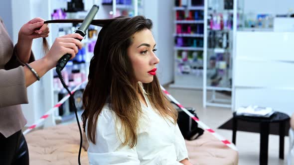 Beautiful Brunette Woman in a Beauty Salon