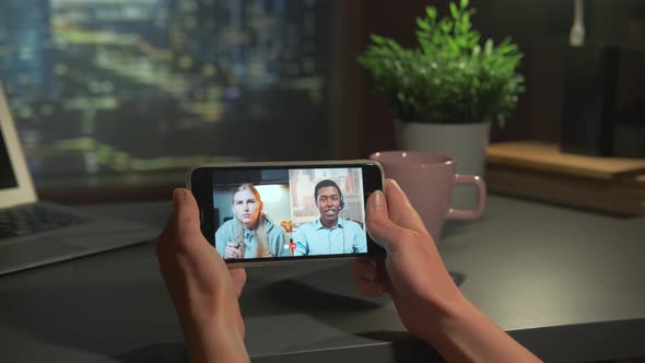 Video Meeting with Multiracial Team on Smartphone