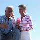 Mature couple blowing bubbles - VideoHive Item for Sale