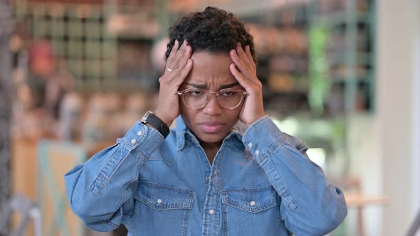 Portrait of Disappointed African Woman Reacting To Loss 