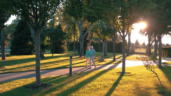 Elderly Couple Walking in Slow-mo.