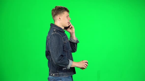 Man Walking Talking on the Phone and Drinking Coffee, Chroma Key, Slow Motion, Side View