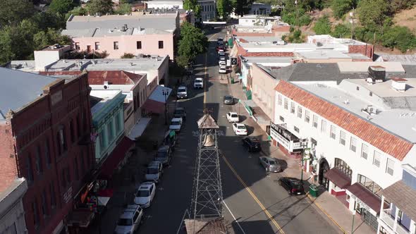 Close-up aerial shot of the belltower in Placerville town square. 4K