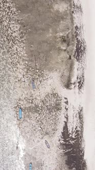 Vertical Video of Low Tide in the Ocean Near the Coast of Zanzibar Tanzania