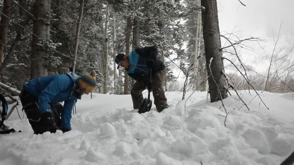 Digging A Snow Shelter