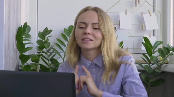 Young Woman Working on a Computer at Home