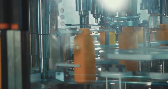 Filling of chemical bottles in a production line