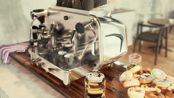 Closeup of the Coffee Machines That are Operating Automatical alt