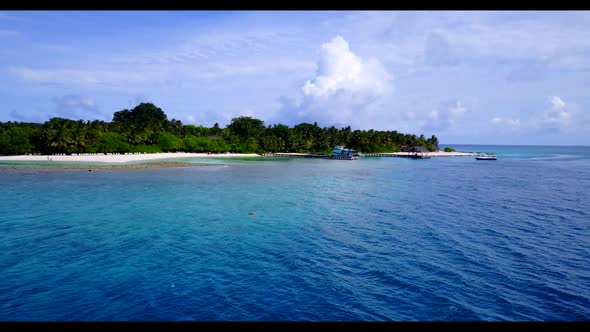 Aerial nature of beautiful island beach voyage by blue green sea with white sand background of a day