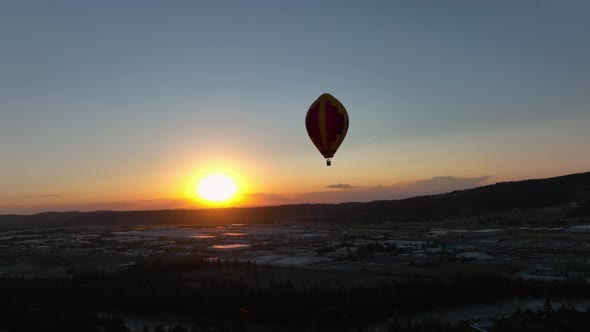 Aerial view of a hot air ballon at sunset over the Spokane Valley in Eastern Washington.